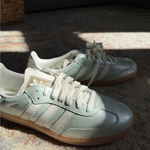 Never worn before original sambas. Shimmery light blue/green